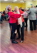 Christmas Party 2023 Two women dancing
