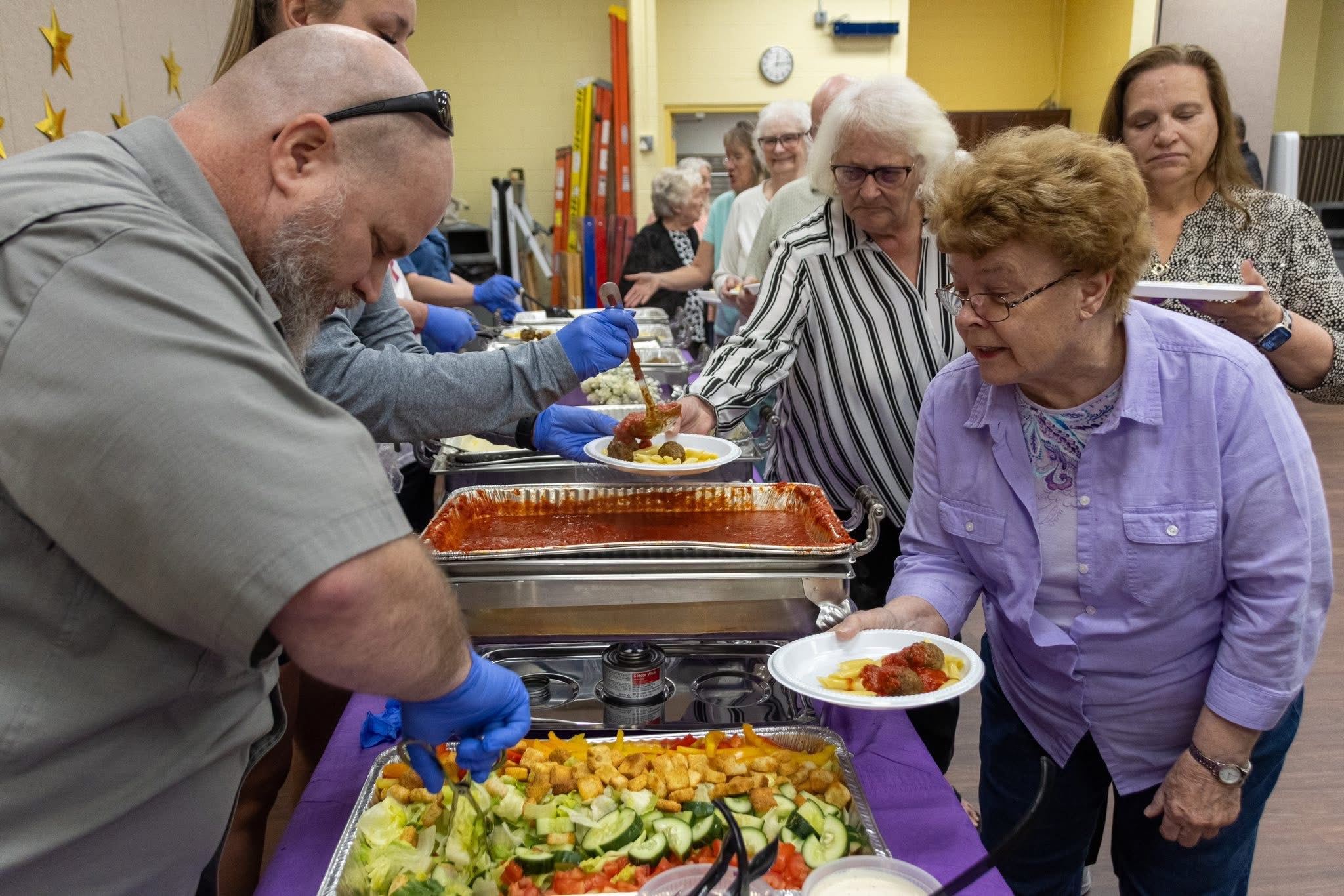 Volunteers Serving Seniors Lunch